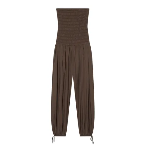 Dames Mode Geplisseerd Tubetop Jumpsuit Elegant Effen Kleur Wijde Pijpen Trekkoord Zoom Slank Makend Mouwloos Romper Streetwear
