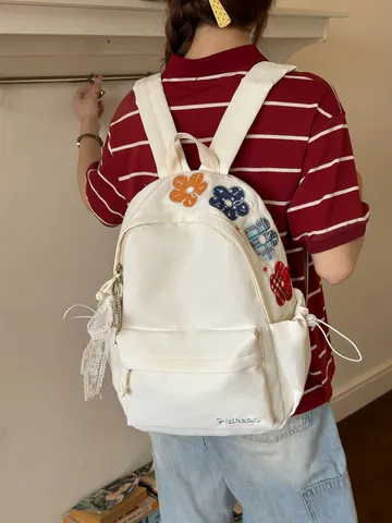 Harajuku-Stil Damen Schulrucksack Kontrastfarbe Blumenstickerei Große Kapazität Nylon Rucksack Mit Spitzenbogen-Anhänger