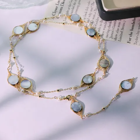 Collana con Catena a Maglione Lunga in Conchiglia di Perle Naturali e Perline di Rame da Donna Gioielli Geometrici Stile Vacanza