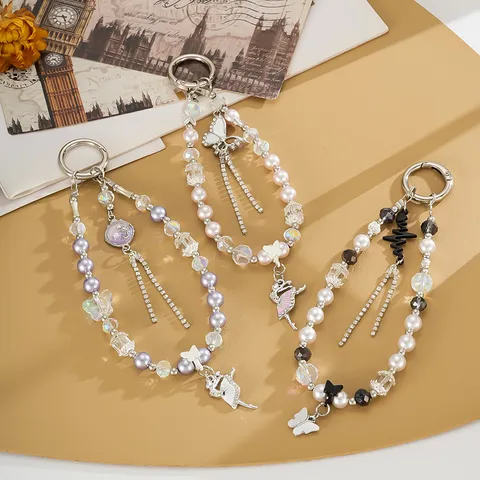 High-End Hohl Schmetterling Quaste Handy-Anhänger Nische Ballett-Mädchen Perlen Tasche Anhänger Strass Schlüsselanhänger Zubehör Damen Geschenk