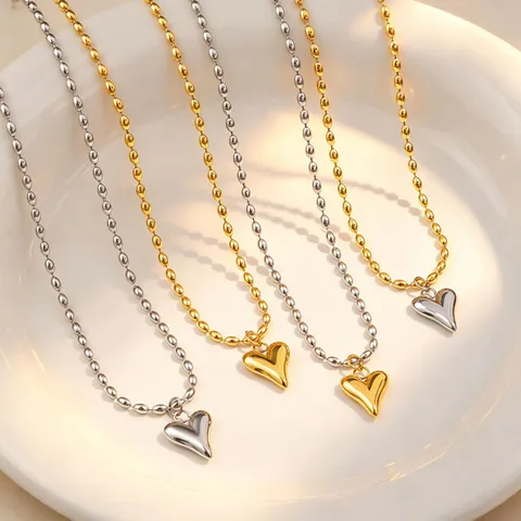 Titanium Steel Heart Pendant Necklace Two-Tone Gold Silver Rice Bead Chain For Women Luxurious Minimalist Clavicle Necklace Fashion Jewelry