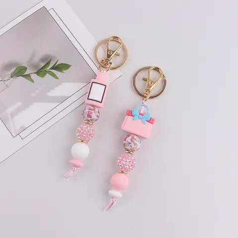 Portachiavi in Perline di Silicone Carina Boccetta di Profumo Rosa Ciondolo da Borsa per Donne Ragazze Anello Portachiavi Arredo Zaino Regalo