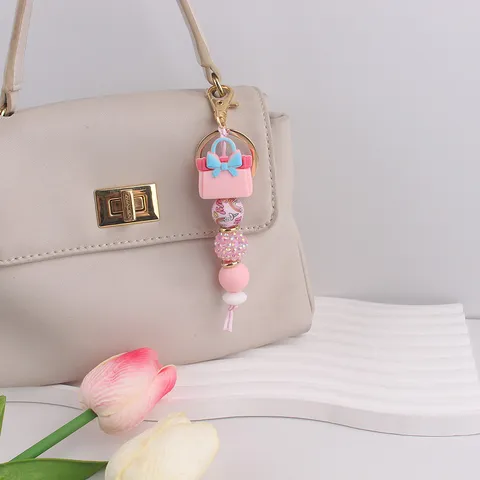 Portachiavi in Perline di Silicone Carina Boccetta di Profumo Rosa Ciondolo da Borsa per Donne Ragazze Anello Portachiavi Arredo Zaino Regalo