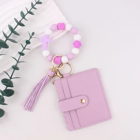 Porte-clés Bracelet en Perles de Silicone pour Femmes Portefeuille Porte-cartes en Cuir Avec Pendentif Croix Pompon Anneau Porte-clés pour Filles