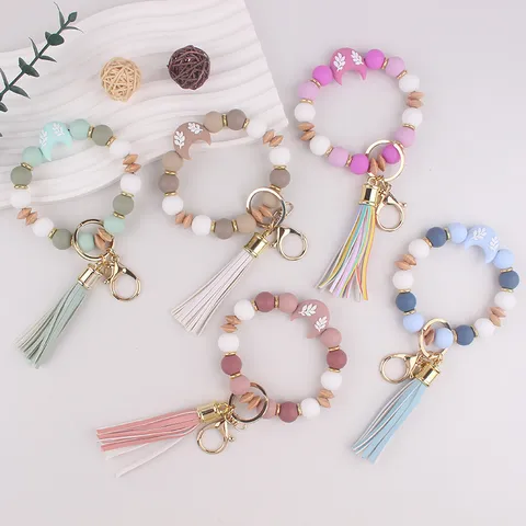 Llavero de Pulsera de Cuentas de Silicona de Luna con Borla de Cuero y Cuenta de Madera Anillo de Llave para Bolsos Mujer Niña Regalo