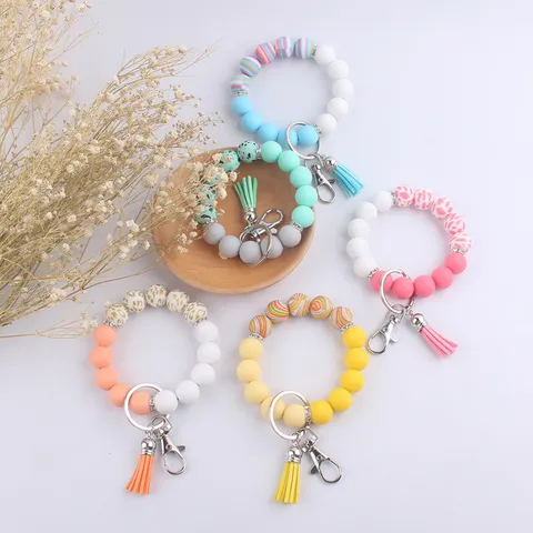 Porte-Clés Bracelet en Perles de Silicone Avec Gland en Similicuir Imprimé Léopard Tournesol Tête de Mort Anneau de Poignet Pour Clés Voiture Sac Accessoires
