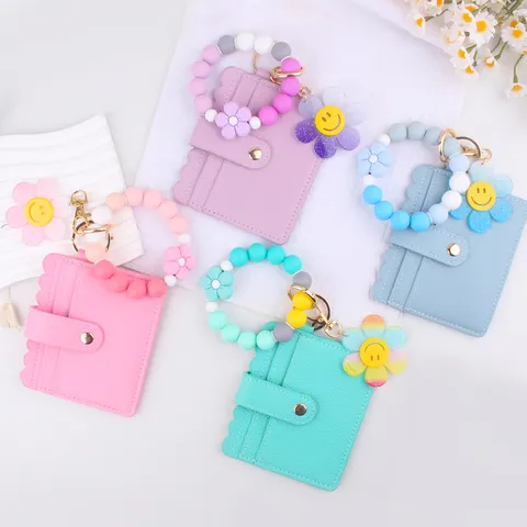 Süßer Cartoon Sonnenblume Karteninhaber Schlüsselanhänger Silikon Perlen Armband Handgelenk Geldbörse Legierung Schlüsselring Anhänger Für Frauen
