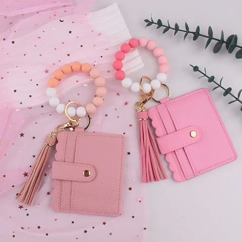 Porte-Clés Bracelet en Perles de Silicone Porte-Cartes en Cuir PU Portefeuille Couleur Unie Anneau Clé Avec Gland pour Femmes Hommes