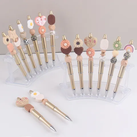 Kreativer DIY Perlen Kugelschreiber Süß Cartoon Gänseblümchen Herz Silikon Holz Perlen Drehmechanismus Schreibstift Büro Schule Schreibwaren
