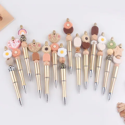 Kreativer DIY Perlen Kugelschreiber Süß Cartoon Gänseblümchen Herz Silikon Holz Perlen Drehmechanismus Schreibstift Büro Schule Schreibwaren