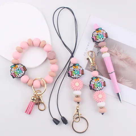 Portachiavi con Perline in Silicone Cartone Animato Polsino Cordino Mela Insegnante Regalo Anello Penna Accessori