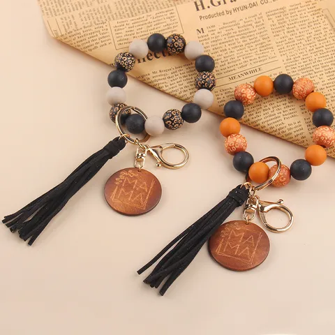 MAMA Silicone Bead Tassel Keychain For Women Leopard Print Wood Bead Wristlet Keyring PU Leather Tassel Bracelet Keychain Mother's Day Gift