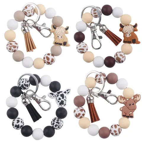 Llavero de Cuentas de Silicona de Vaca Animada con Borla de Cuero PU Colgante de Bolso Correa de Muñeca Accesorio Lindo