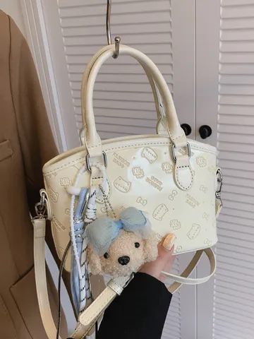 Femme PU Cuir Seau Sac Cartoon Imprimé Bandoulière Sac Urbain Minimaliste Décontracté Épaule Sac à Main avec Mignon Peluche Pendentif