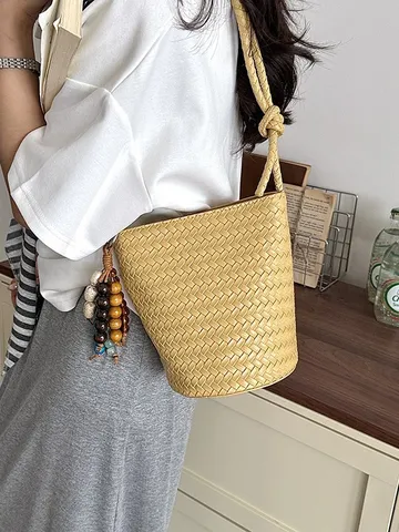 Femmes Mode Tissé Sac Seau Cuir PU Rétro Casual Couleur Unie Épaule Bandoulière Avec Pendentif Poignée Sac à Main