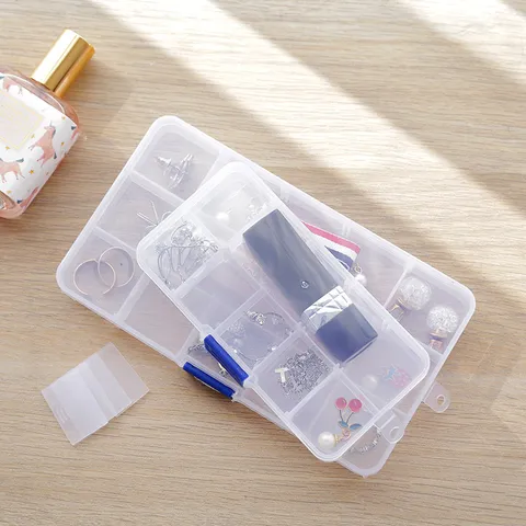 Boîte de Rangement à Bijoux en Plastique Transparent Avec Couvercle Organisateur Multi Grilles Boîte à Pilules Claire Portable