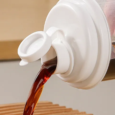 Bottiglia di Stoccaggio in Plastica PP Portatile Contenitore Dispenser di Liquido Trasparente con Scala e Coperchio per Microonde per Cucina