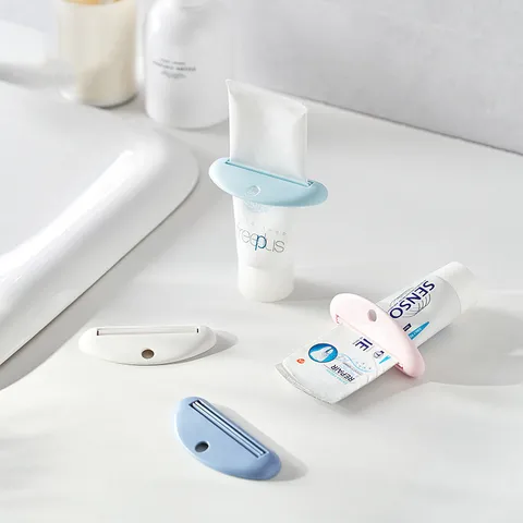Spremi Dentifricio Manuale Dispenser per Detergente Viso Spremitubi in Plastica Supporto per Organizzazione Bagno Strumento Estrattore Crema Mani