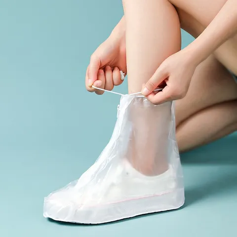 Unisex Wasserdichte Wiederverwendbare Überschuhe Rutschfeste Regenschuhüberzüge Mit Reißverschluss Und Verstellbarem Kordelzug PVC Transparent Überschuhe