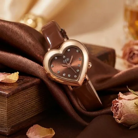 GEDI Mode Damen Herzförmige Uhr Roségold Zinklegierung Gehäuse Strass Zifferblatt Quarz Wasserdicht Lederarmband Damen Armbanduhr