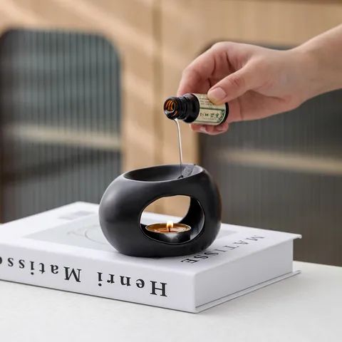 Modern Nordic Ceramic Essential Oil Burner Hollow Egg Shaped Candle Holder For Home Meditation Decor