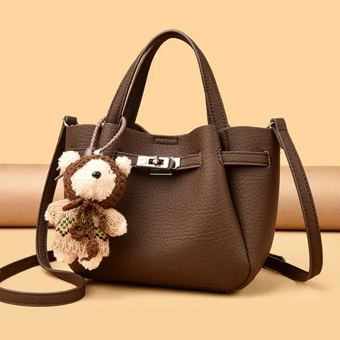 High Quality Leather Lock Bucket Bag Women Handbag Casual Top Handle Bag Stylish Crossbody Bag with Bear Pendant