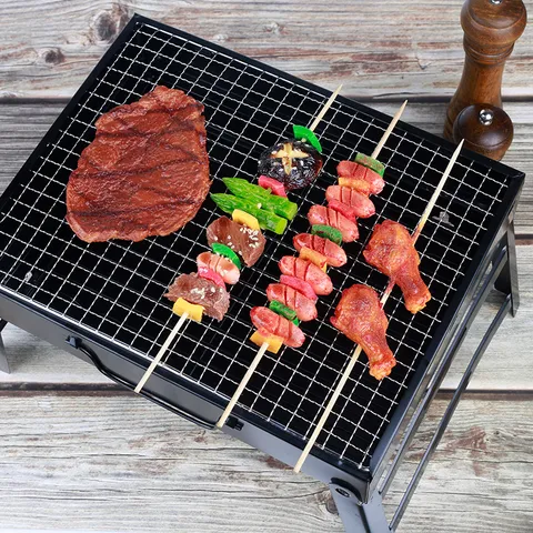 Grille de Barbecue au Charbon Pliable Portable Camping Extérieur Petit Poêle de Cuisson en Acier pour Pique-Nique de Jardin