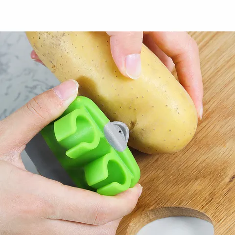 Pelador de Frutas y Verduras de Acero Inoxidable con Dito Creativo Herramienta de Cocina de Plástico