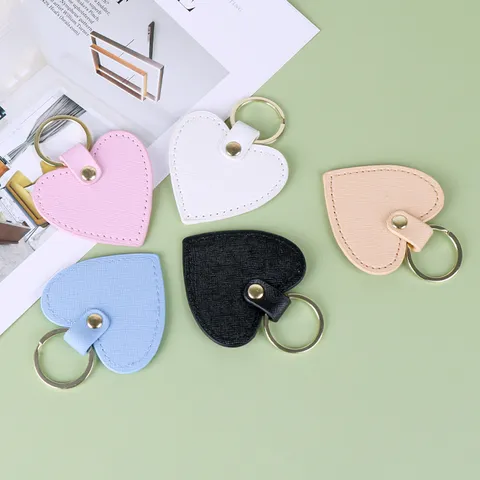 Lindo Llavero de Cuero de Corazón Colgante de Bolso de Borla Creativo Anillo de Llave