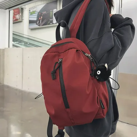 Unisex Lightweight Waterproof Nylon Backpack Casual Hiking Travel Daypack School Bag For Students Men Women With Plush Charm