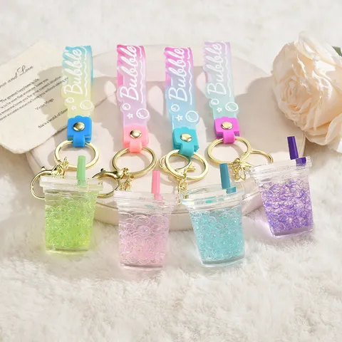Süße Leuchtende Treibsand Milchteetasse Schlüsselanhänger Kreative Acryl Flüssigkeit Pailletten Taschenanhänger Schwimmende Flasche Schlüsselring Für Studenten Mädchen