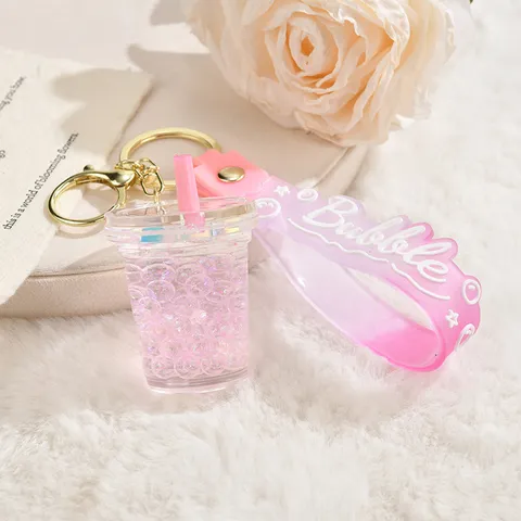 Süße Leuchtende Treibsand Milchteetasse Schlüsselanhänger Kreative Acryl Flüssigkeit Pailletten Taschenanhänger Schwimmende Flasche Schlüsselring Für Studenten Mädchen