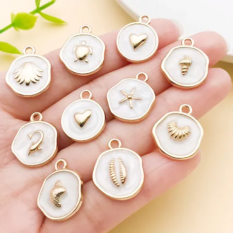 Blanc Nacré Alliage de Zinc Océan Animaux Marins Charms Pendentifs Forme de Cœur Étoile de Mer Dauphin Tortue Conque Émaillé Fournitures Bijoux Pour DIY Collier Porte-clés Artisanat