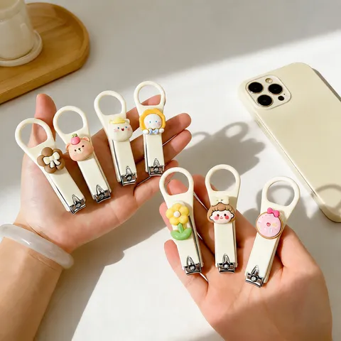 Lindo Estilo Cremoso Dibujos Animados Acero Inoxidable Cortauñas Portátil Estudiante Cortador de Uñas Manicura