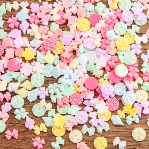 Mini Ciondoli in Resina Luminosa Conchiglia Fiocco Stella Fiore Perline per Decorazione Unghie Fai da Te Accessori Gioielli