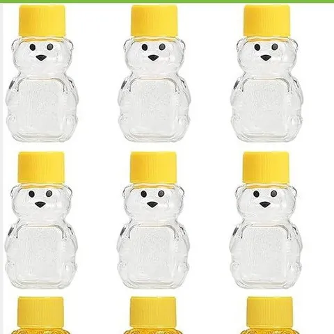 Transparente Plastik Bär Honig Flasche Süße Cartoon Saft Behälter Tragbare Getränkespender Mit Gelbem Deckel