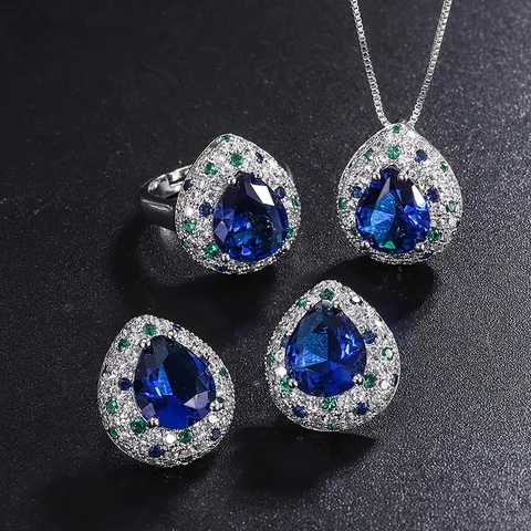 Set di Gioielli in Strass Zaffiro Blu Tanzanite Simulato a Goccia d'Acqua Vintage per Donna Collana Orecchini Anello in Rame Placcato Oro