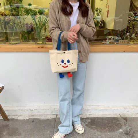 Cute Cartoon Face Canvas Bento Bag With 3D Legs For Women Student Portable Lunch Bag Mini Embroidered Handbag Tote Bag
