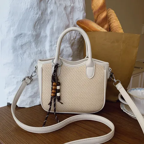 Vintage Damen Webmuster PU Leder Umhängetasche Casual Nischen Crossbody Eimertasche Mit Perlenanhänger Tägliche Elegante Handtasche