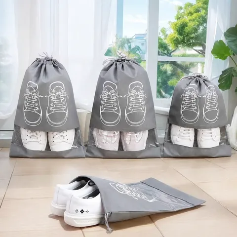 Tragbarer Vliesstoff Schuhbeutel Staubdichter Feuchtigkeitsdichter Kordelzugbeutel Reise Schuhabdeckung Organizer