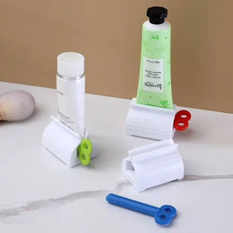 Manual Plastic Toothpaste Squeezer Rotating Tube Dispenser Facial Cleanser Presser Bathroom Organizing Tool