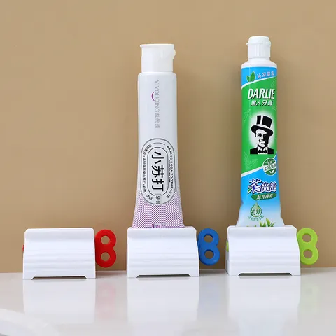 Manual Plastic Toothpaste Squeezer Rotating Tube Dispenser Facial Cleanser Presser Bathroom Organizing Tool