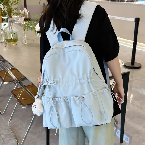 Lockerer Nylon Plissierter Rucksack Für Damen Reise Schultasche Mit Schleife Und Süßem Anhänger