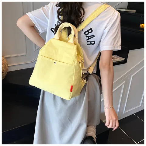 Minimalistischer Nylon Casual Rucksack Vielseitige Bonbonfarbene Pendler Schule Reise Tasche Für Damen