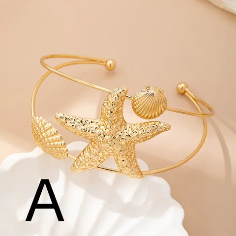 Bracciale da Braccio Aperto con Stella Marina e Conchiglia per Donna Stile Marino in Lega Placcata Oro Gioielli da Vacanza