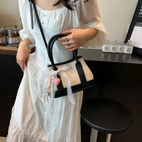 Women Casual Canvas PU Leather Spliced Bucket Bag Elegant Lace Bowknot Heart Pendant Crossbody Shoulder Handbag For Daily Travel