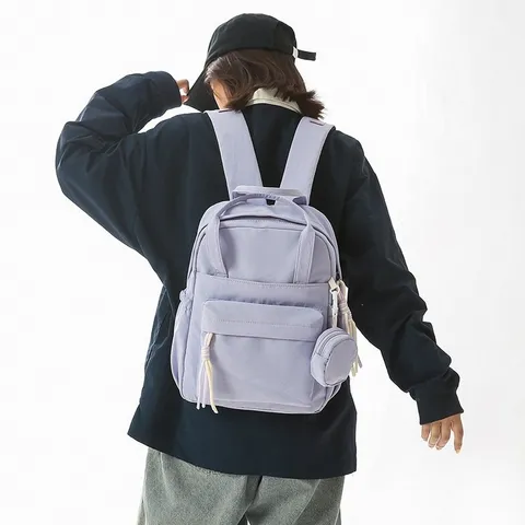 Sac à Dos Tendance en Nylon pour Femmes Couleur Unie Décontracté Sac de Voyage Léger Sac d'École Avec Pendentif Mini Porte-Monnaie