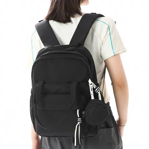 Sac à Dos Tendance en Nylon pour Femmes Couleur Unie Décontracté Sac de Voyage Léger Sac d'École Avec Pendentif Mini Porte-Monnaie