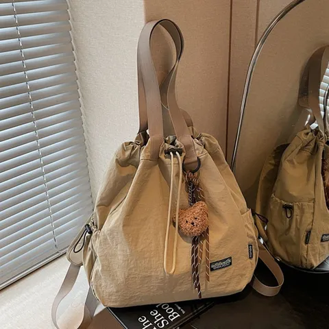 Korean Style Canvas Drawstring Bucket Backpack For Women Large Capacity Multi-functional Shoulder Bag With Bear Pendant