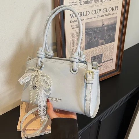 Damen Urban Minimalistisch PU Leder Eimertasche Nähte Design Große Kapazität Schultertasche Umhängetasche Mode Einfarbig Handtasche Mit Künstliche Perle Schleife Anhänger